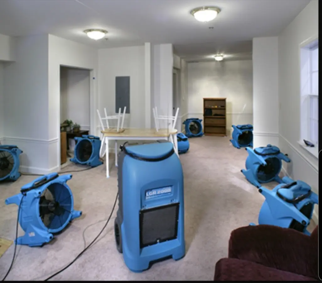 Air movers and dehumidifier setup for Water Damage Restoration in Gibsonville